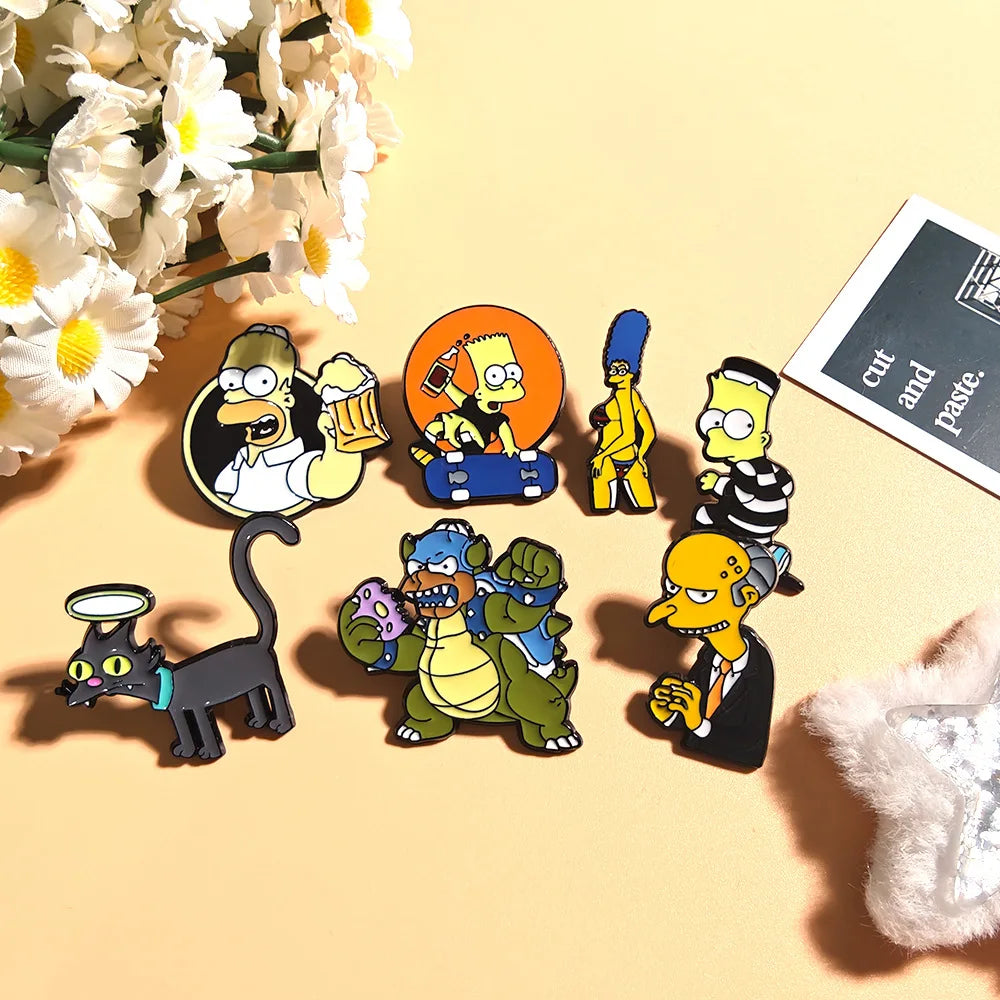 Lot de 7 Pin's Simpsons - Springfield et Boule de Neige